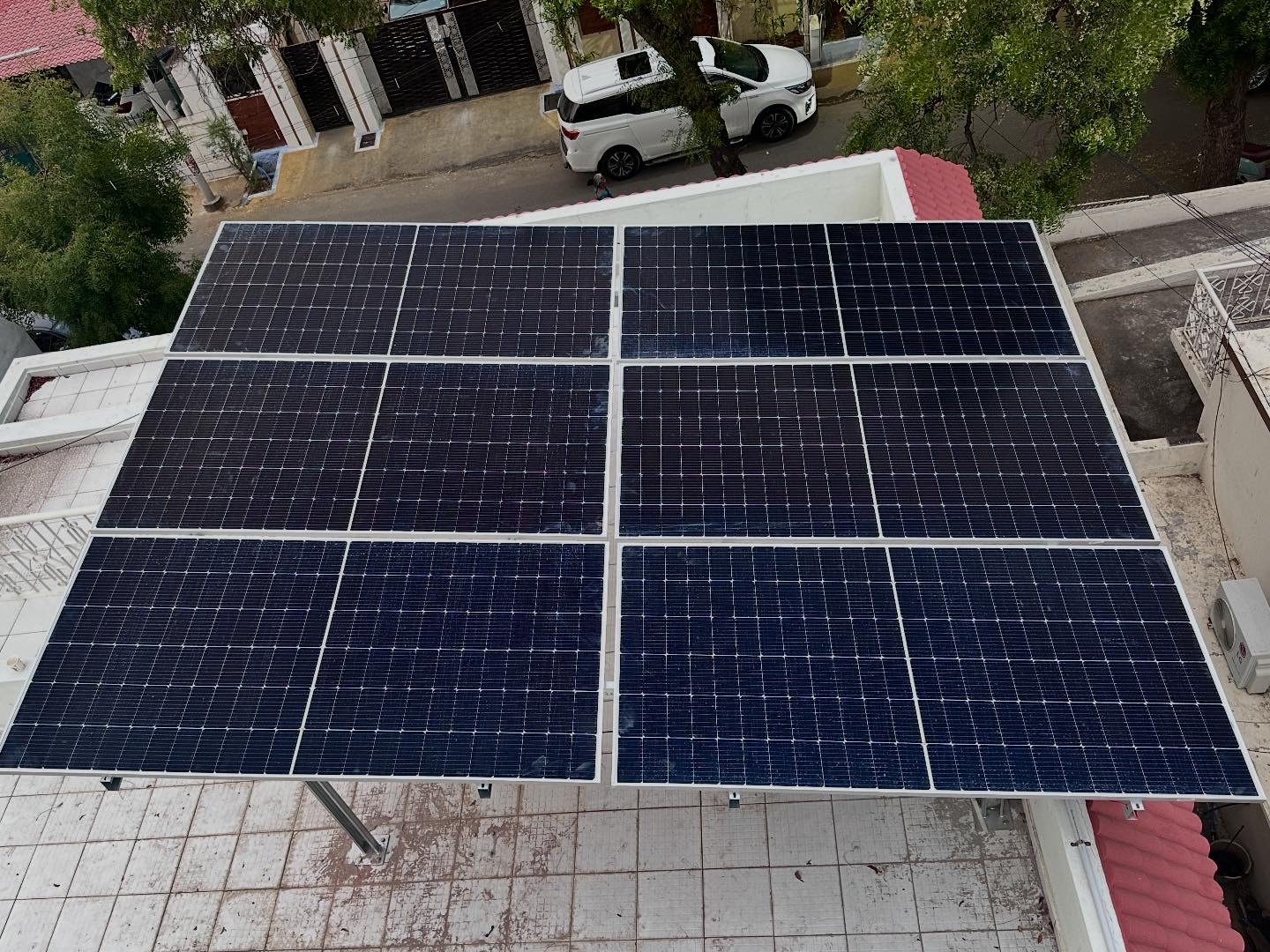 Overhead view of rooftop solar panels